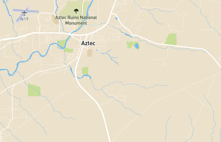 Map showing the general Aztec, New Mexico area and surrounding county roads in San Juan County, used for geographic context in a burglary case report.